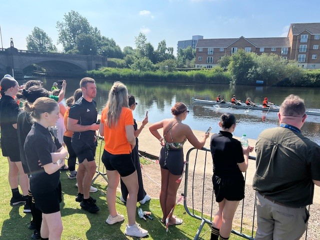 Public Watching Children Rowing